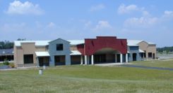 A large red, blue, and beige building.